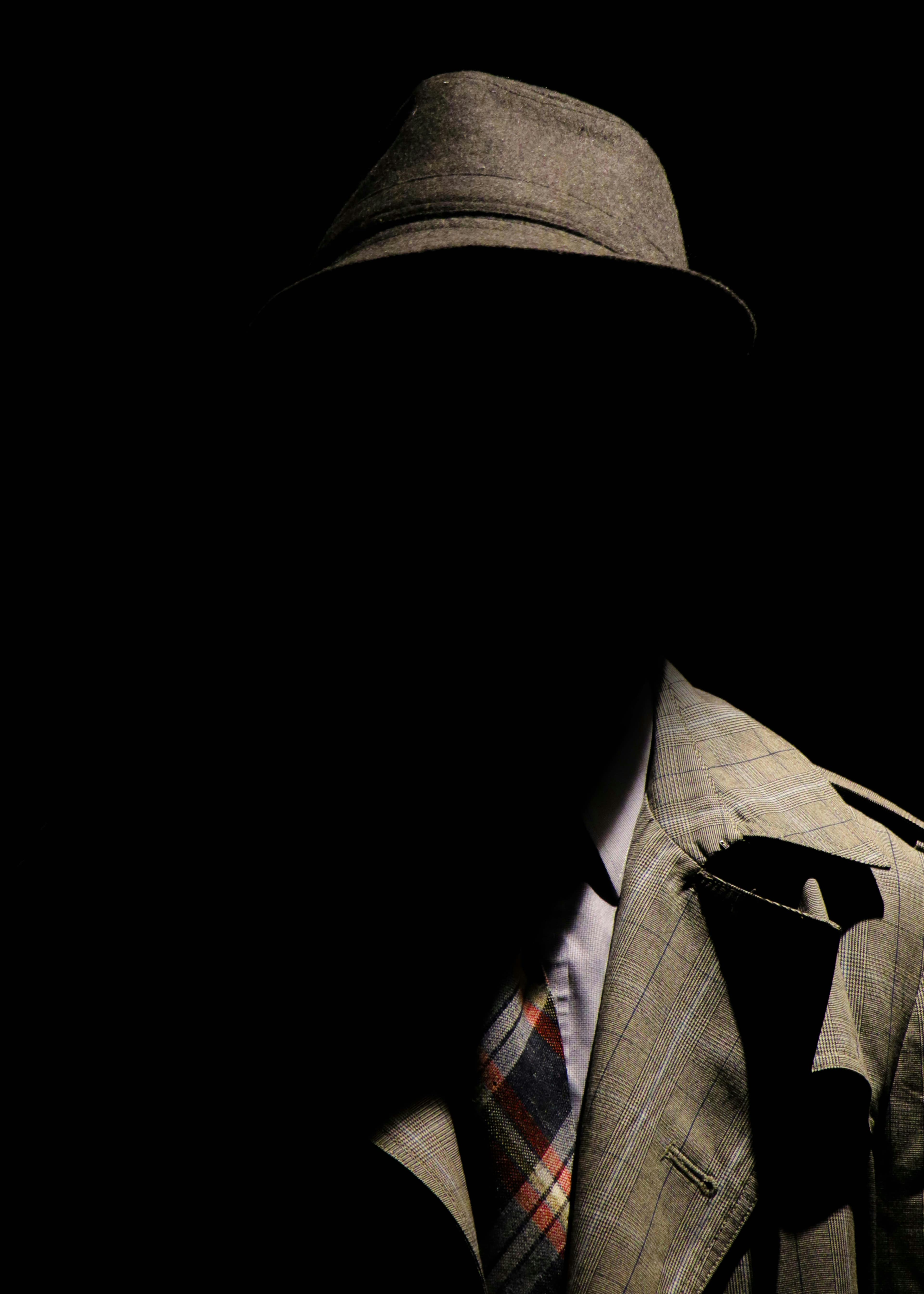 Private detective in classic investigative attire